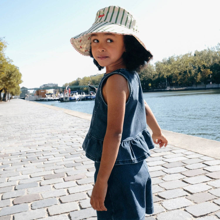 Cherry Kiss Stripy Reversible Hat showing both print options.