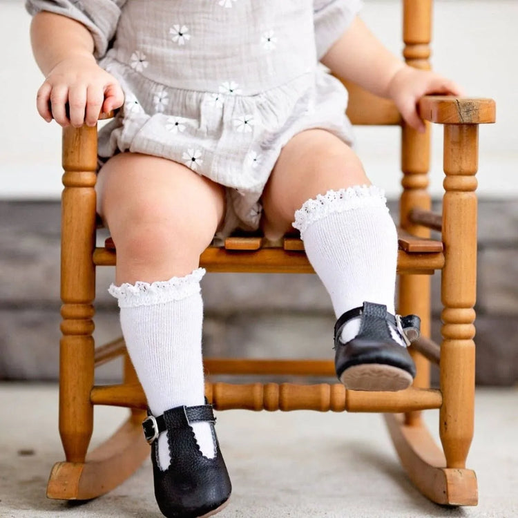 
                    
                      White Lace Top Knee Highs styled as classic knee high socks for babies and toddlers
                    
                  
