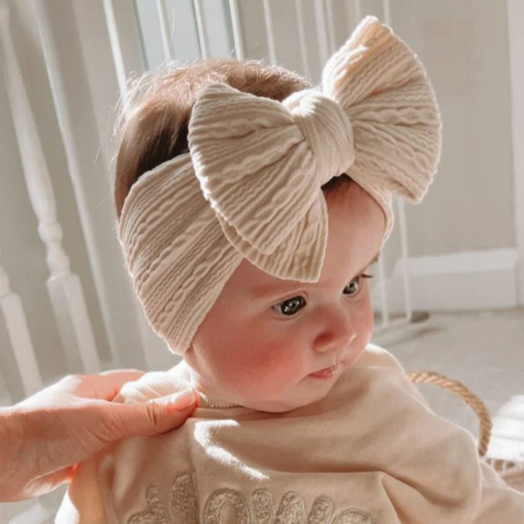 
                    
                      Cream Stretch Bow Headband for baby girls
                    
                  