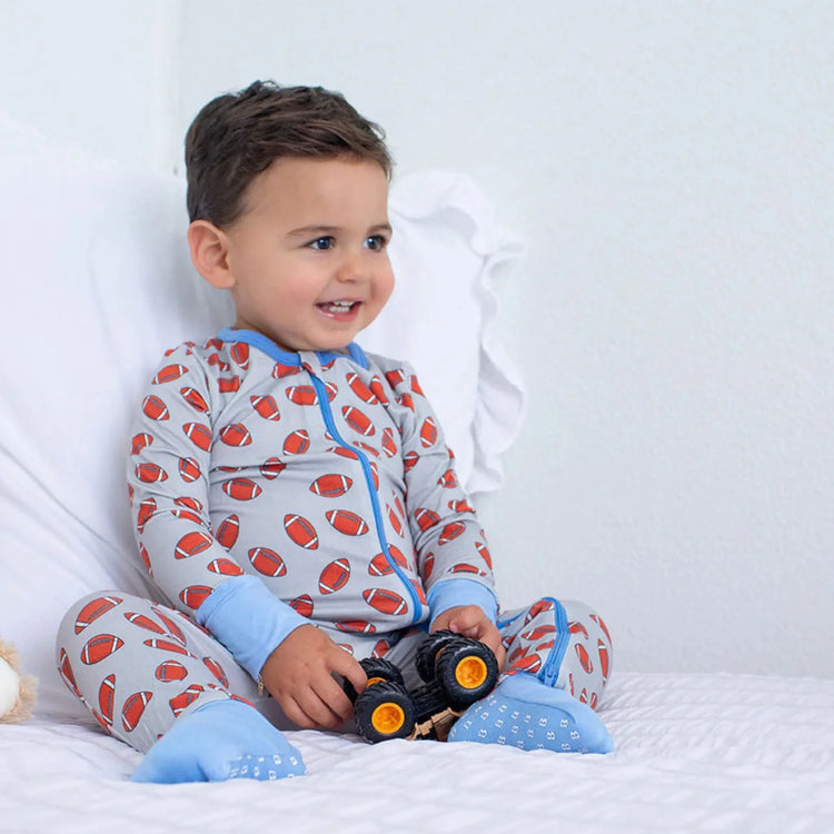 Huddle Up Convertible Coverall styled as a cozy bamboo one-piece baby outfit