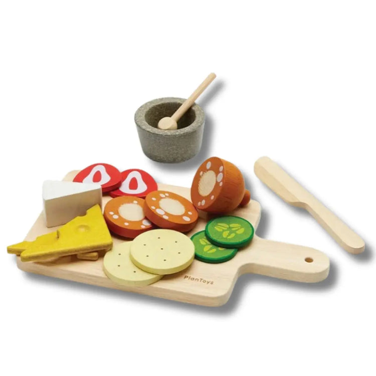 
                    
                      PlanToys Cheese & Charcuterie Board, wooden play set with brie, gouda, salami, crackers, and cutting board on a white background
                    
                  