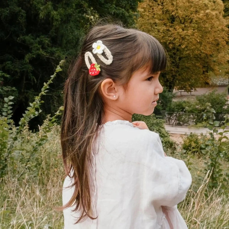 Rockahula Kids Crochet Daisy and Strawberry Clips on cream snap clips. toddler girl 