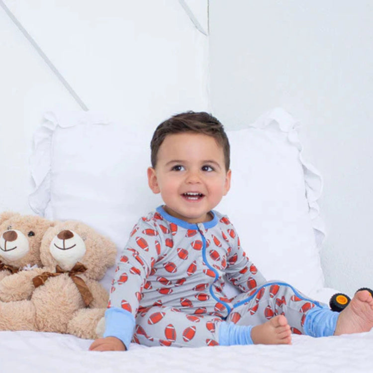 Huddle Up Convertible Coverall featuring bamboo fabric and football-inspired design for baby boys