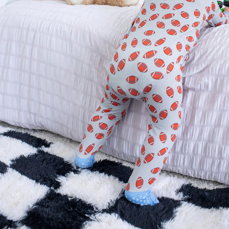 Huddle Up Convertible Coverall shown as a breathable bamboo baby coverall for everyday wear