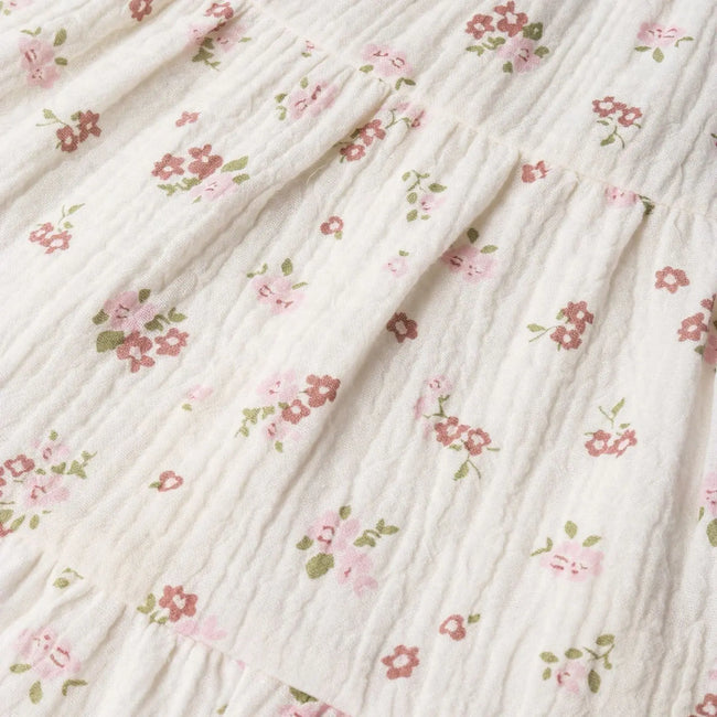 Organic Cotton Sleeveless Ruffle Bubble Romper - Blush Floral, back view of romper showing snap closures and blush floral organic cotton interlock