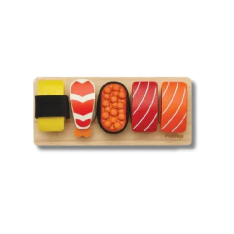 
                    
                      PlanToys Sushi Set, wooden play set with salmon, tuna, tamago, shrimp, roe, tray, and shoyu bottle on a white background
                    
                  
