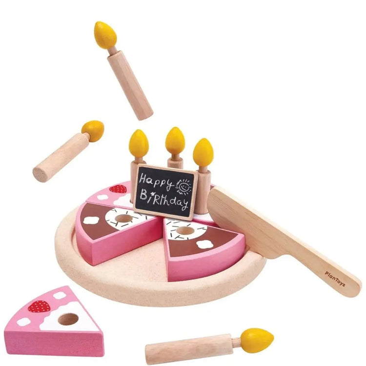 PlanToys Birthday Cake Set, wooden play cake with six slices, candles, knife, and chocolate bar nameplate on a white background
