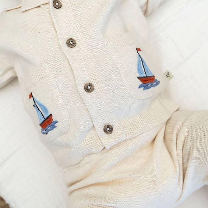 
                    
                      Sailboat Embroidered Pocket Baby Shirt & Pants Set, Viverano Organics nautical baby boy organic cotton button-front shirt with sailboat embroidered pockets and matching pants
                    
                  