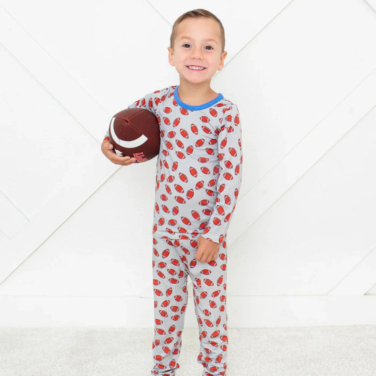 Huddle Up Pajama featuring bamboo fabric and football-inspired print for kids