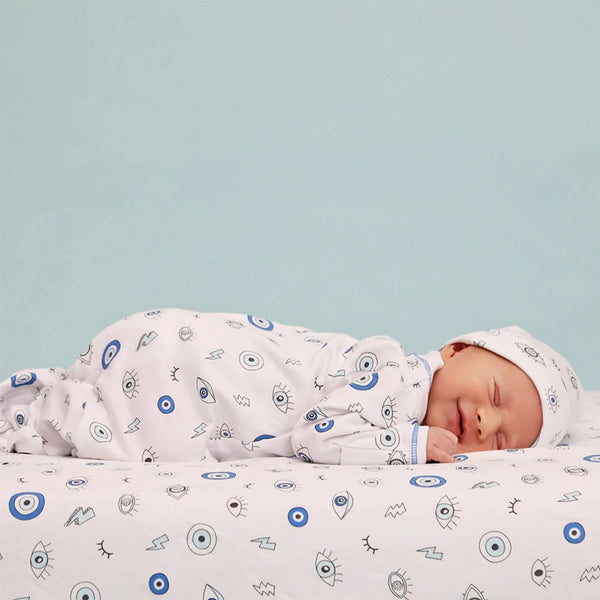 Evil Eye Pattern Footie Pajama made from soft Pima cotton designed as a baby footed sleeper