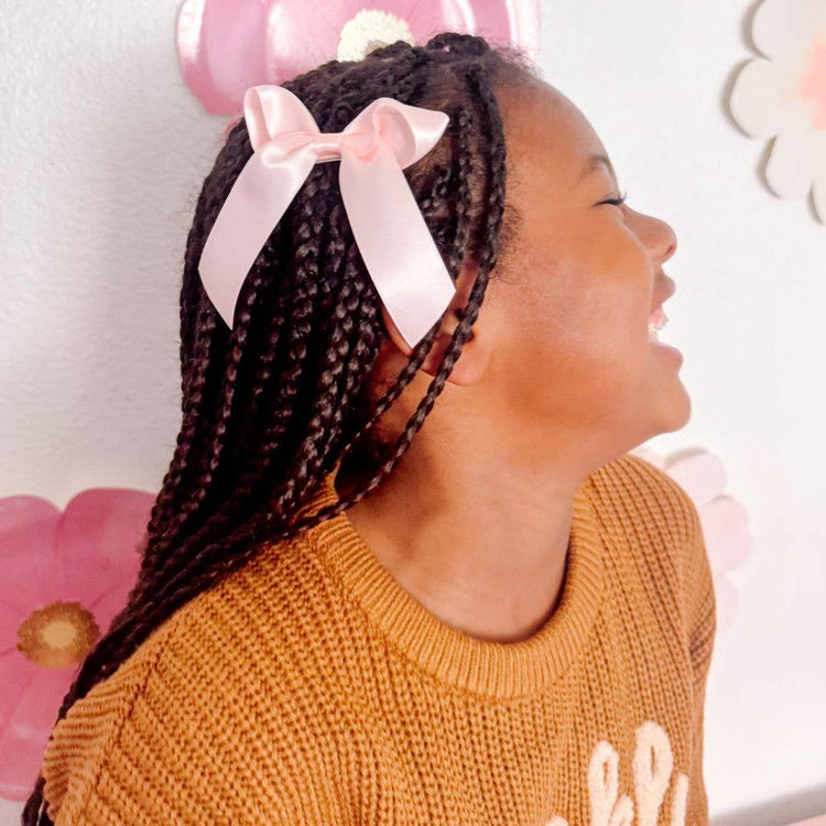 Trendy Sweet Wink Coquette Satin Bow Clip for toddler and baby girls.