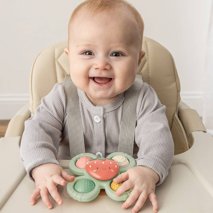 
                    
                      Itzy Ritzy Itzy Pop and Whirl strawberry sensory fidget toy with suction base and four textured silicone poppers for babies 6 months and up
                    
                  