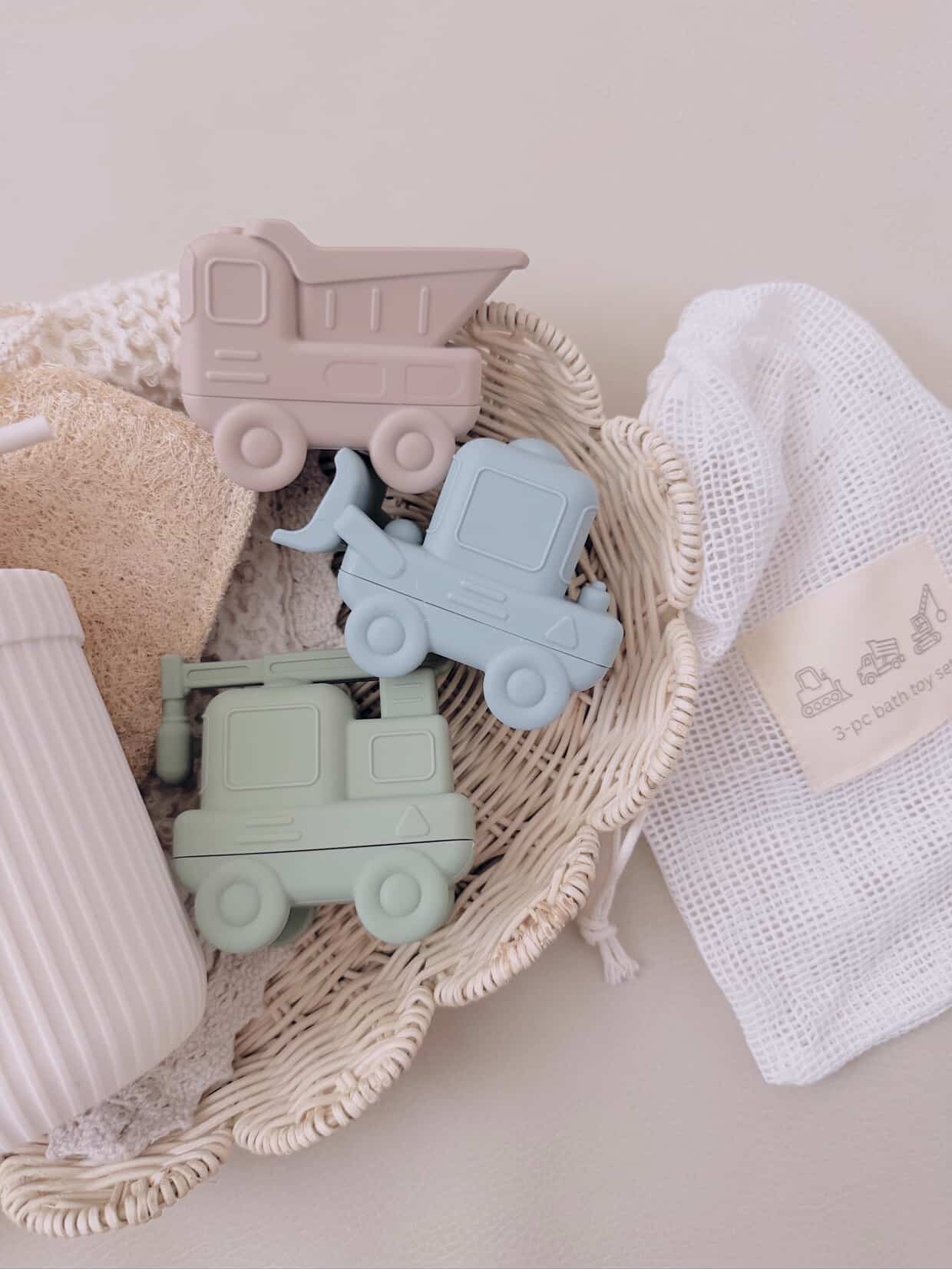 Baby playing in bath with silicone construction vehicles bath toy set