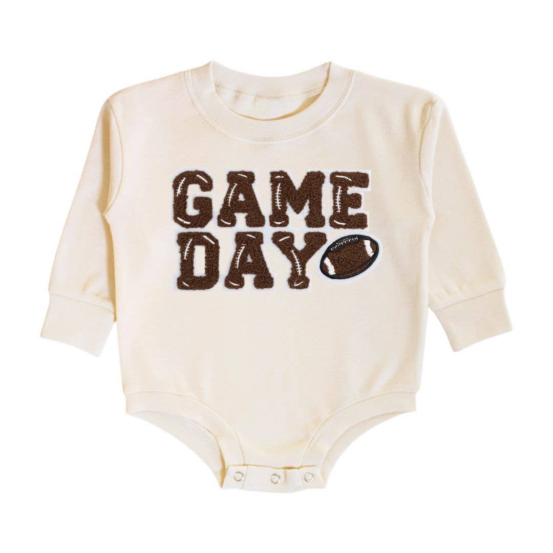 Close-up of chenille “GAME DAY” letters on Game Day Patch Romper