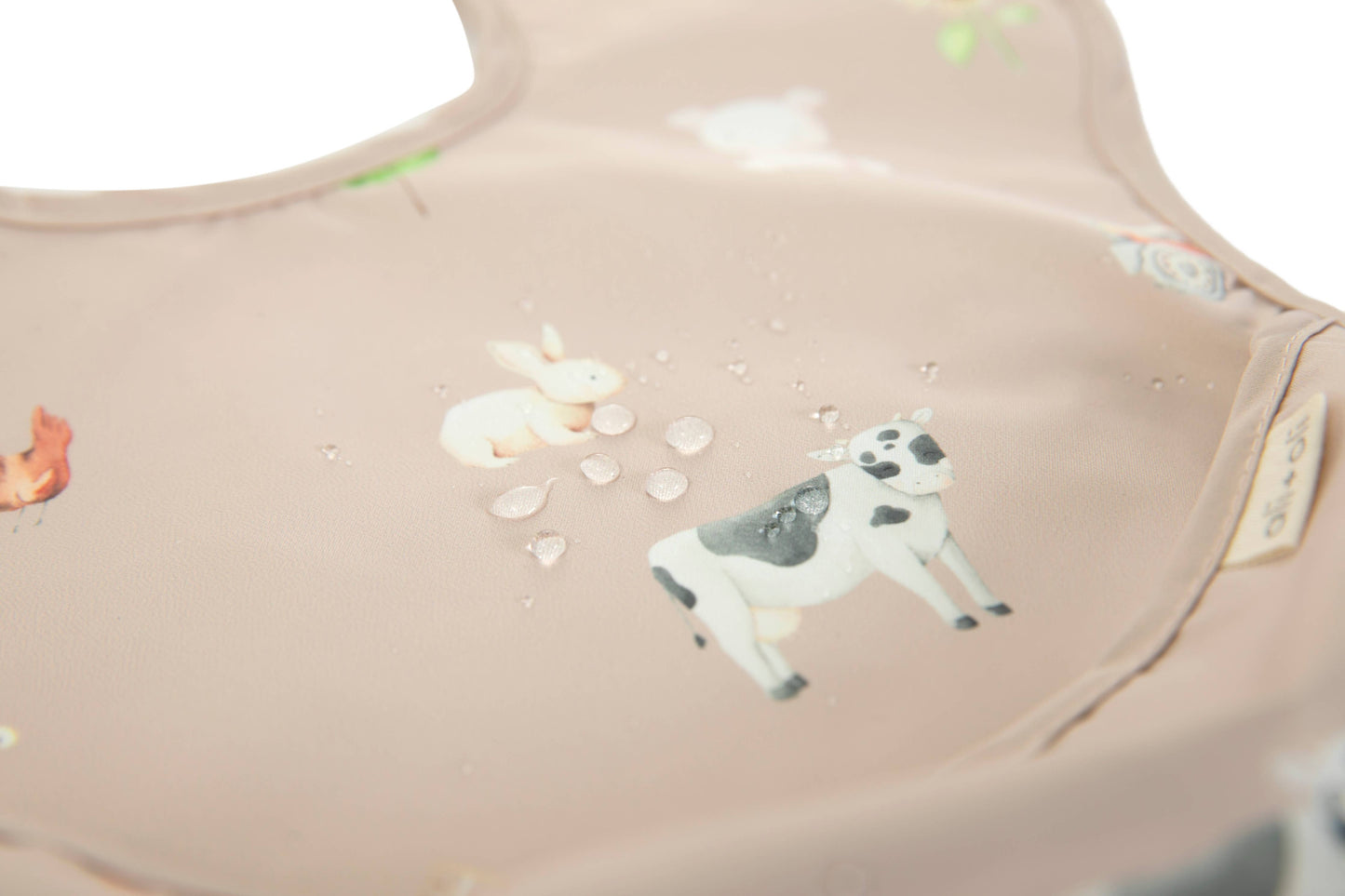 Close-up of fabric texture on animal print sleeveless bib set