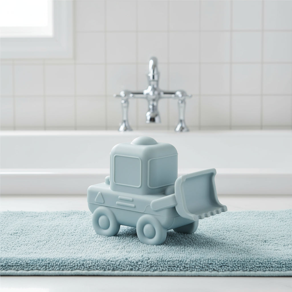 Close-up of textured silicone construction vehicles bath toy set details