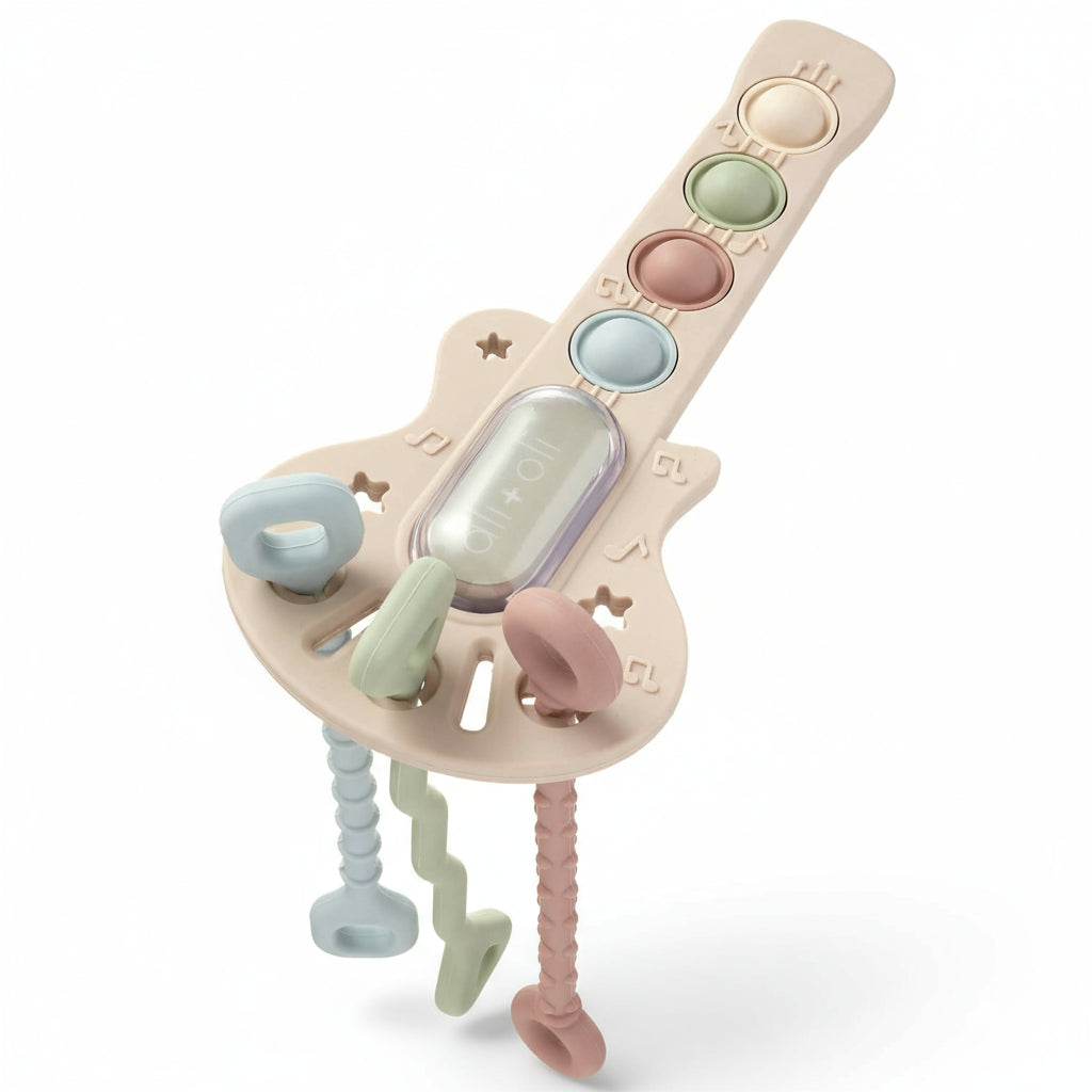 Close-up of textured silicone guitar teether toy details
