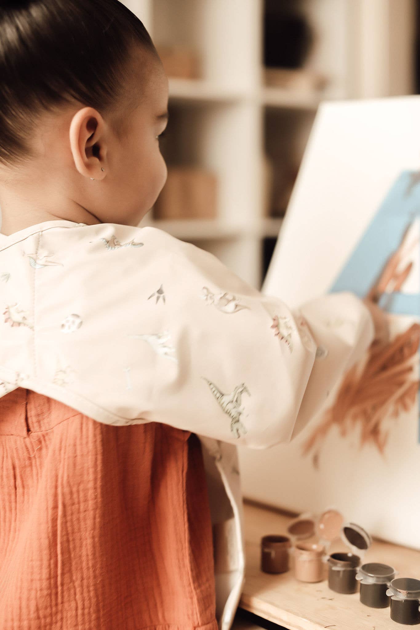 Cute dino print smock bib set ready for mealtime or crafts