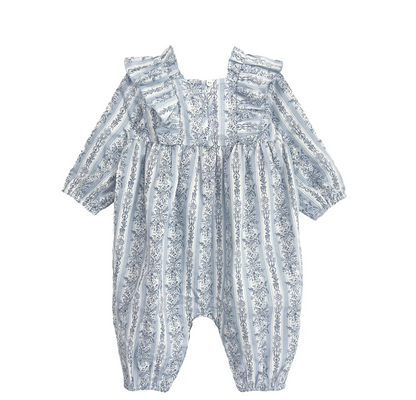 Infant romper in soft blue with ruffle accents