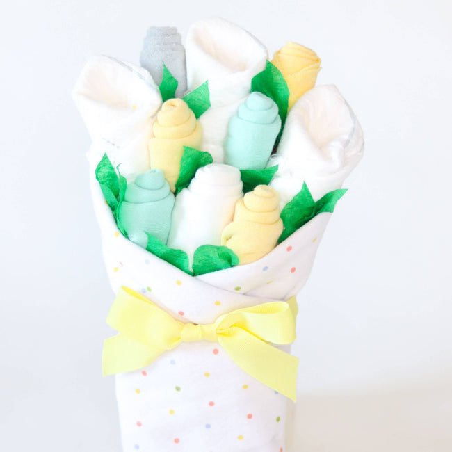 Neutral Dots Blossom Bouquet, gender-neutral baby gift bouquet handcrafted from diapers, socks, bodysuit, blanket, and washcloths in soft neutral dots