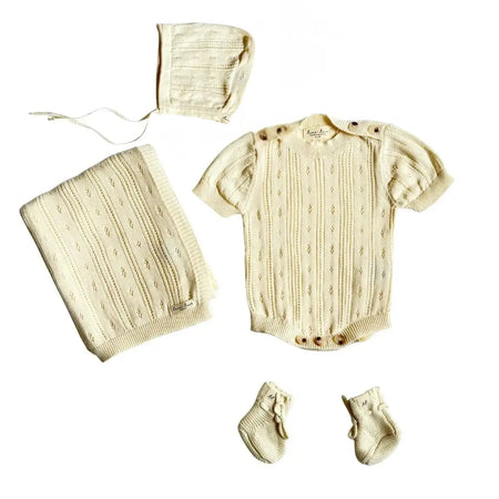 Bring Me Home Summer Pointelle Bundle - Cream 4-piece organic cotton newborn set with romper, bonnet, booties and blanket