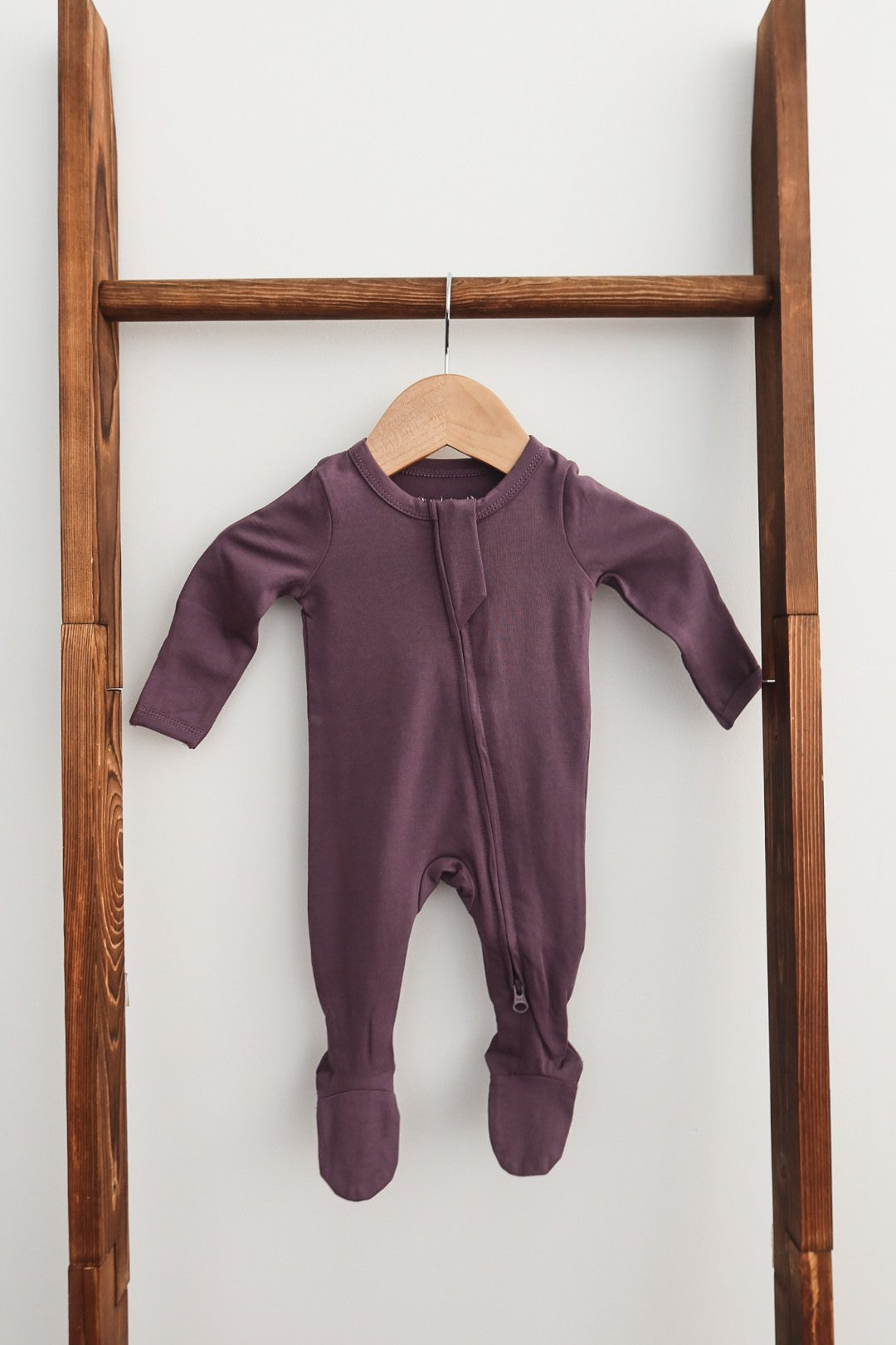 Infant and toddler zip-up footie in elderberry purple – The Jojo by Olive Sprout Kids