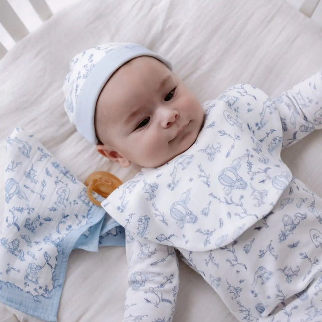 3-Piece Newborn Set - Toile De Jouy / Blue - bib and hat detail from Atelier Babbi 3-piece newborn set