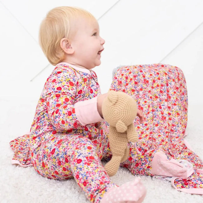 Pink Floral Print Bamboo Convertible Coverall Blush Bloom Convertible Coverall shown as a breathable bamboo coverall for babies and toddlers