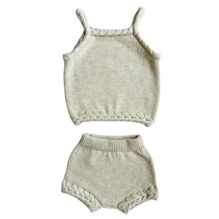 Shop the Braided Tank and Bloomers Set an 100% organic cotton baby two-piece set with braided tank detailing and matching bloomers.