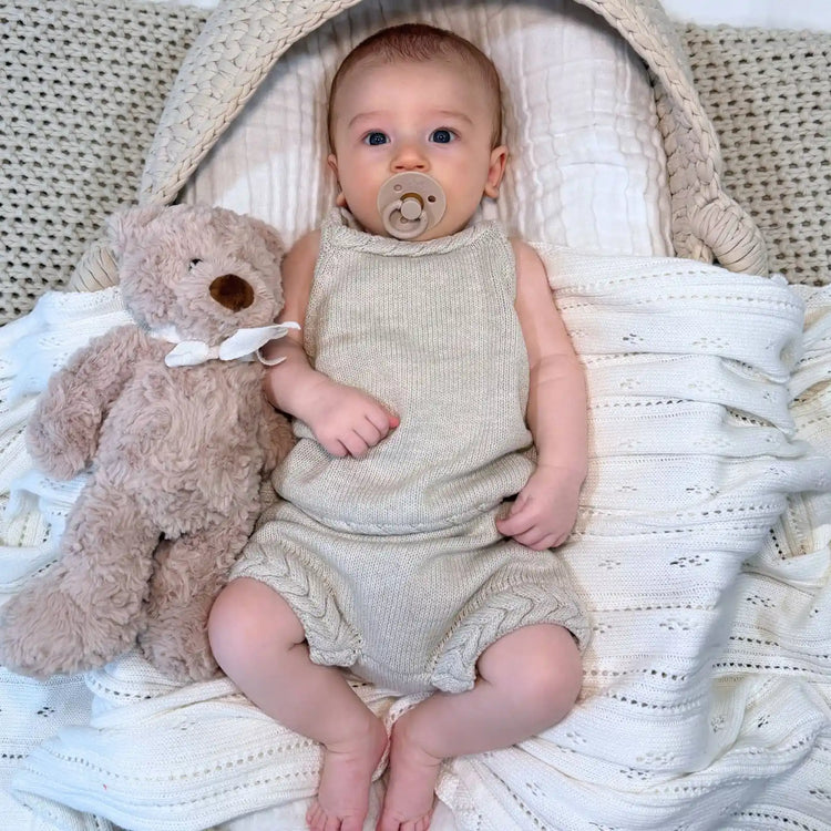 
                    
                      Shop the Braided Tank and Bloomers Set an 100% organic cotton baby two-piece set with braided tank detailing and matching bloomers.
                    
                  