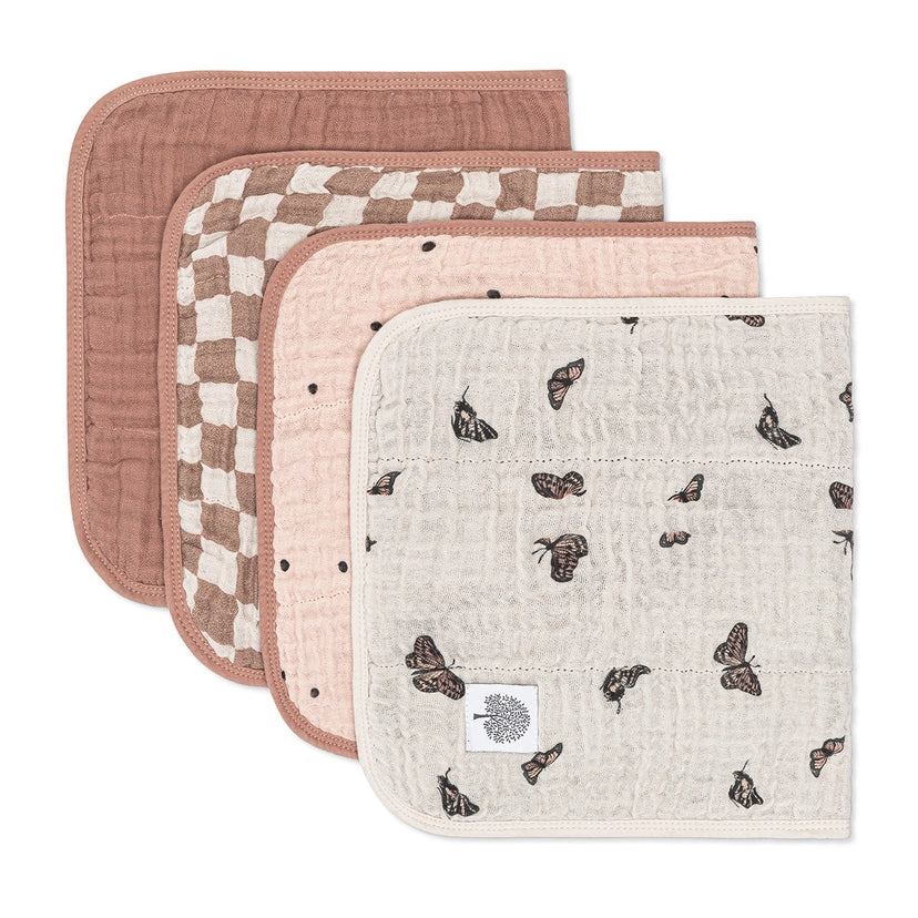 The Flutter Pack muslin burp cloth set for baby messes and spit-up