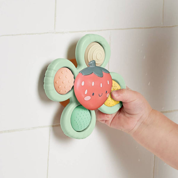 Itzy Ritzy Itzy Pop and Whirl strawberry sensory fidget toy with suction base and four textured silicone poppers for babies 6 months and up