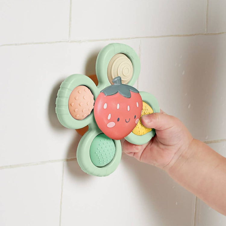 Itzy Ritzy Itzy Pop and Whirl strawberry sensory fidget toy with suction base and four textured silicone poppers for babies 6 months and up