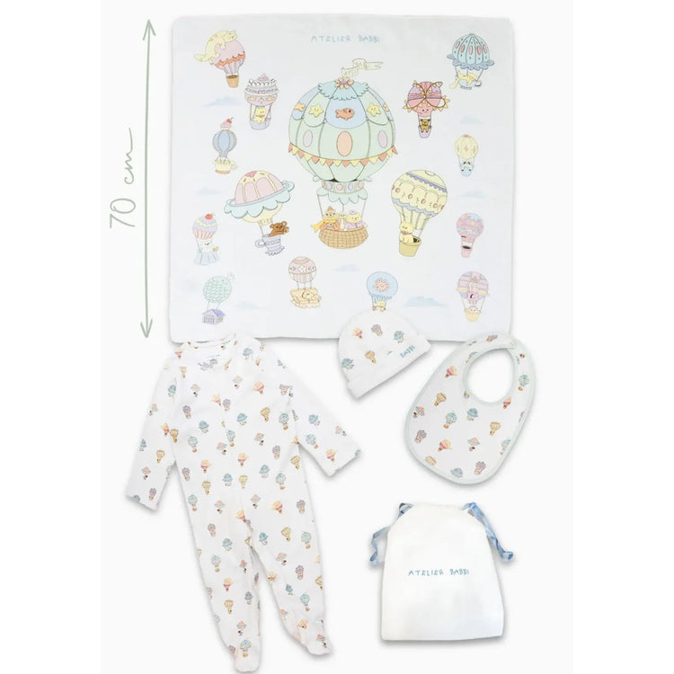 4-Piece Newborn Set - Cappadocia - full set flat lay showing jumpsuit, bib, hat, and muslin swaddle by Atelier Babbi