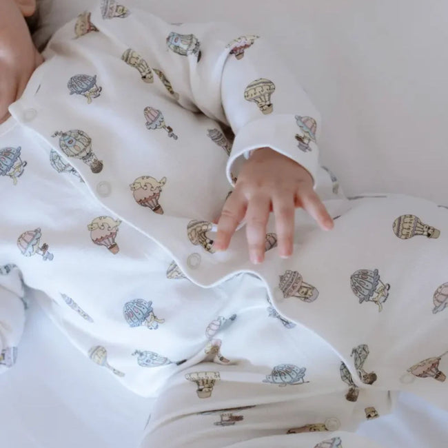 3-Piece Newborn Set - Cappadocia - close-up of Cappadocia hot air balloon cotton print on newborn onesie