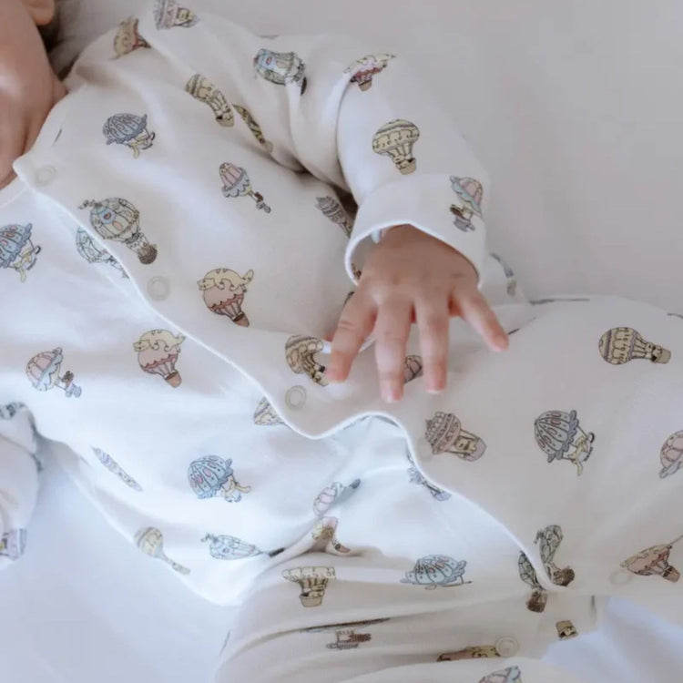 
                    
                      3-Piece Newborn Set - Cappadocia - close-up of Cappadocia hot air balloon cotton print on newborn onesie
                    
                  