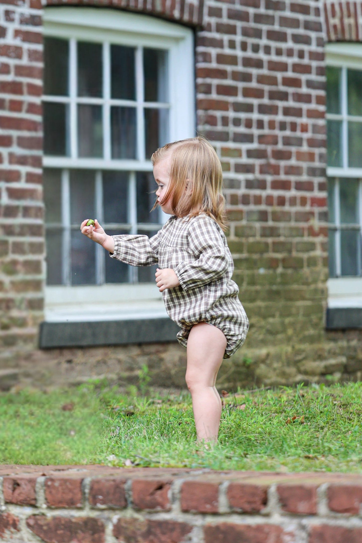 fall plaid baby romper flat lay for baby and toddler girls for autumn