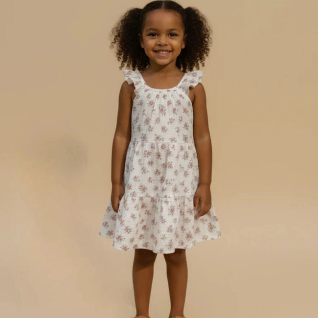 Organic Cotton Ruffle Tiered Dress - Blush Floral, toddler girl wearing dress, front view showing twirl-ready tiered skirt and relaxed summer fit