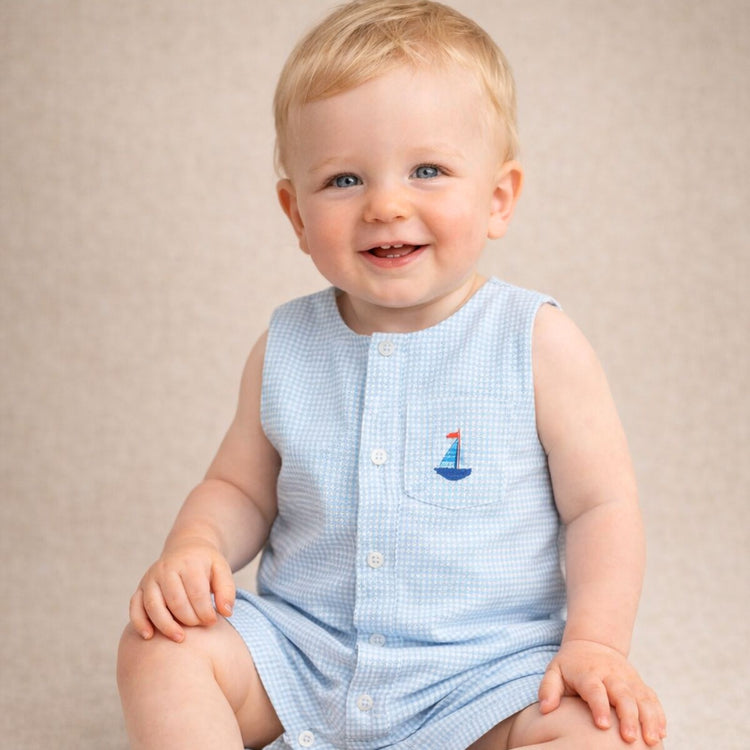 
                    
                      Baby Boy Organic Cotton Nautical Gingham Romper in Blue | Viverano
                    
                  