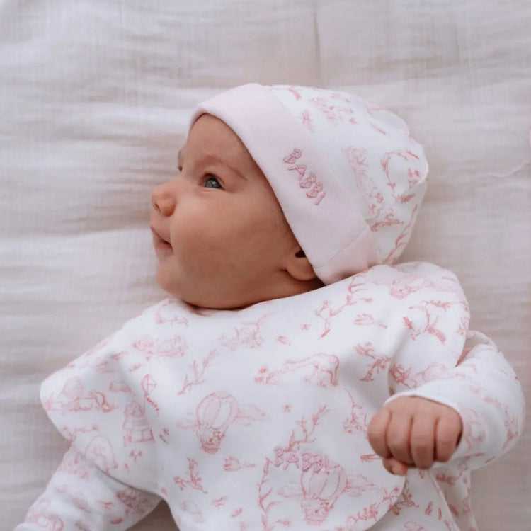 Toile de Jouy Bib & Hat Set in Pink - newborn bib and hat set in pink Toile de Jouy print by Atelier Babbi, 100% cotton