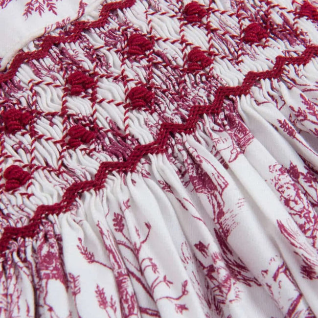 Philomena Smocked Toile de Jouy Dress - Burgundy / White, detail of hand smocking and embroidery on bodice