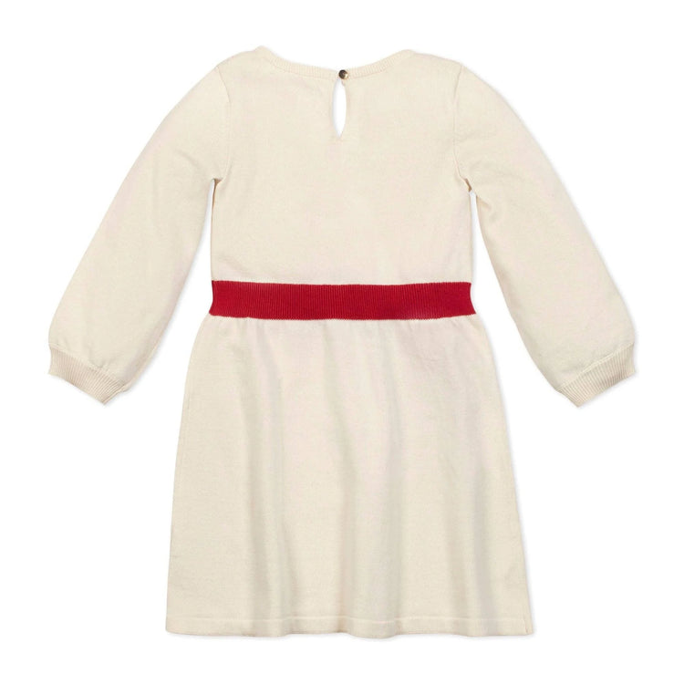 
                    
                      Organic Skater Sweater Dress – White styled as a classic girls sweater dress for fall and winter
                    
                  