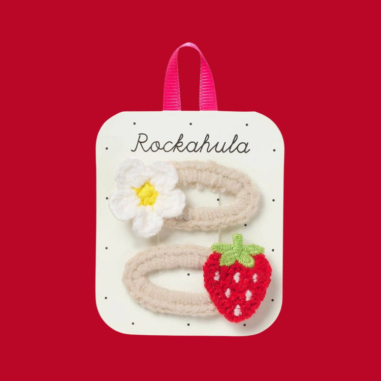 Rockahula Kids Crochet Daisy and Strawberry Clips on cream snap clips.