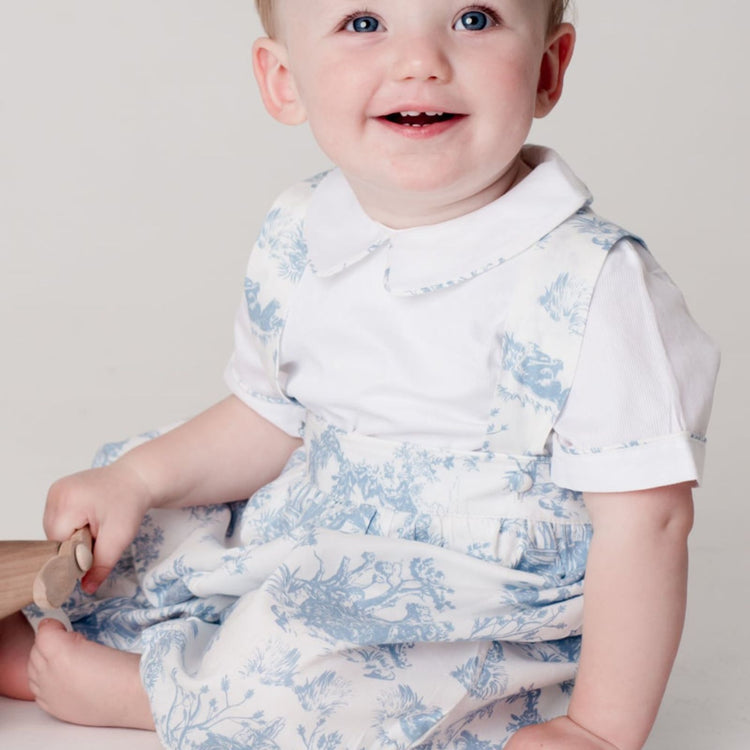 Close-up of Theodore Set piqué shirt with toile piping and fabric-covered buttons, Annafie