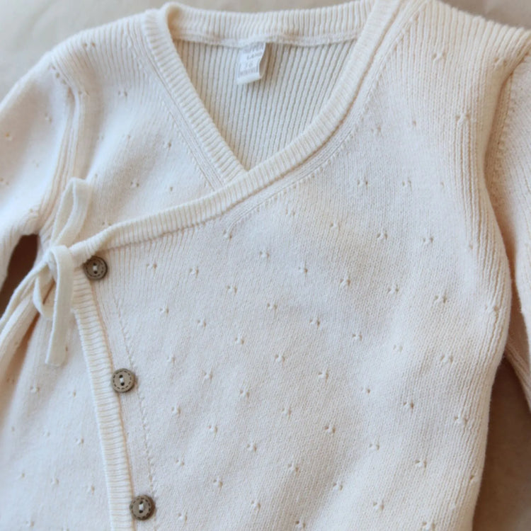 
                    
                      Unisex Baby Kimono Romper in Cream | Olive Sprout Kids
                    
                  
